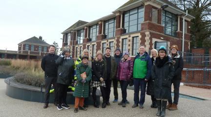 Members of Save Grange Lido and council officers and members on a site visit at Grange Lido