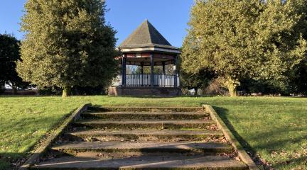 Bandstand surrounded by holly trees