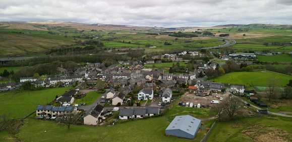 A birds eye view of a rural village in Westmorland and Furness