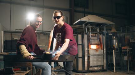 Two women working in a workshop