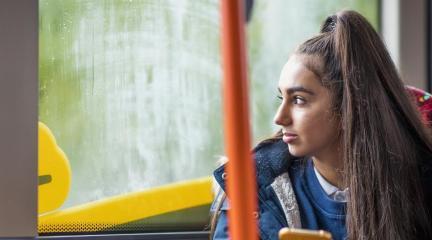 A child on a bus