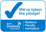 Badge reading We've taken the pledge