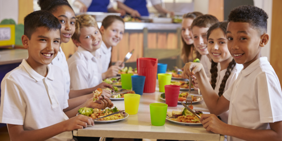 Children having school dinners free school meals