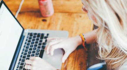 A woman using a laptop