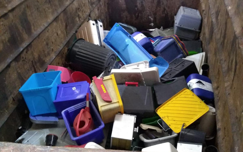 Rigid plastic being recycled