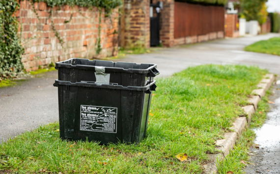 old black recycling boxes