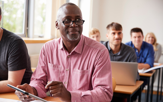 Man studying at an adult education class 