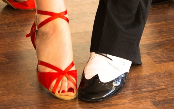 Ballroom dancing shoes on a wooden floor  