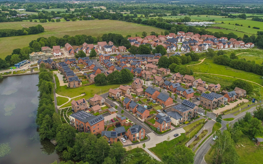 A new community from above showing, housing, roads, green space and more