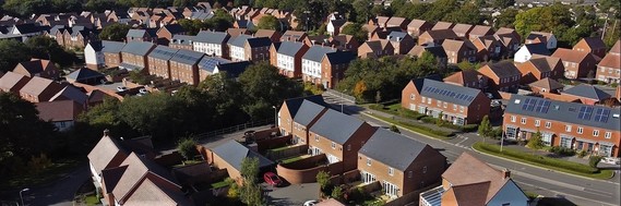 Aerial image of housing in South Wokingham showing rows along a main road