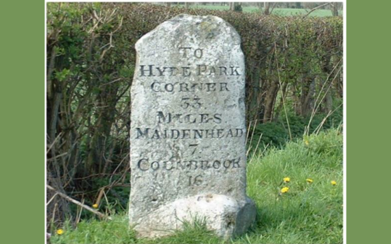 Ruscombe historic stone mile marker showing distance to Hyde Park Corner and Maidenhead 