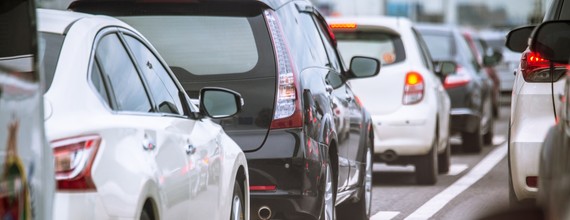 generic image of traffic queuing, viewed from behind one lane