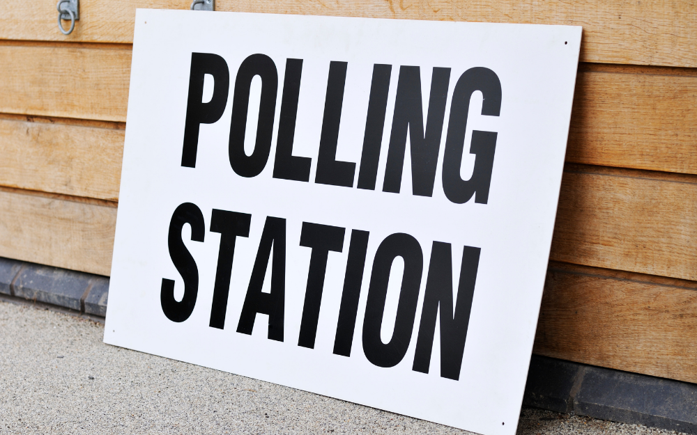 A sign saying 'polling station' outside a polling station