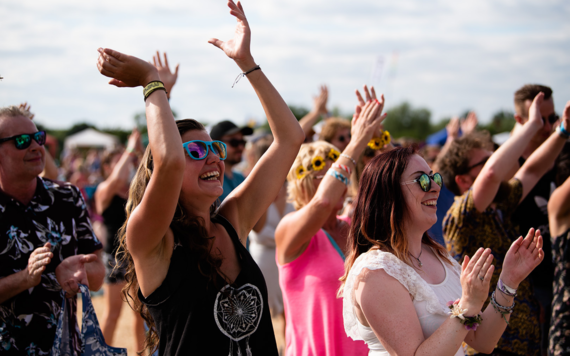 People dancing in the audience at the Marvellous Festival 