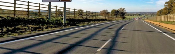 Driver's eye view of the Observer Way relief road at Arborfield on a sunny day