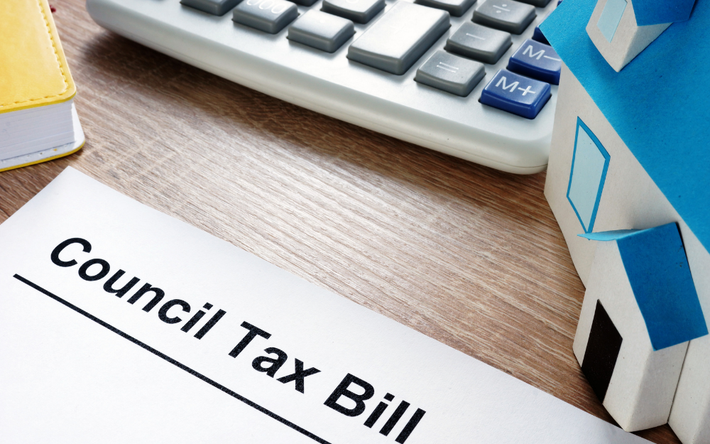 A council tax bill with a calculator in front of it