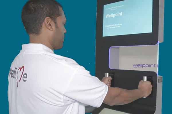 Man using a health kiosk