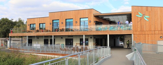 stock photo of the new activity centre at Dinton Pastures at sunset on a summer evening