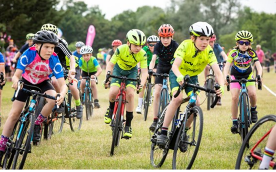 Group of children taking part in a previous cylocross event