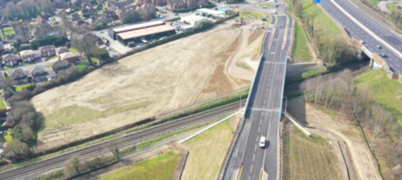 overhead view of the North Wokingham Distributor Road (west of Old Forest Road) including the bridge over the railway line