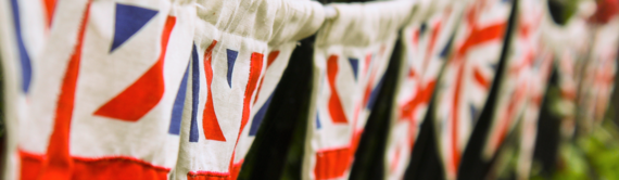 cropped image of Union flag bunting strung up for Queen's Platinum Jubilee celebrations