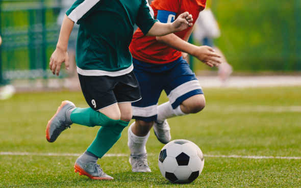 Boys playing football