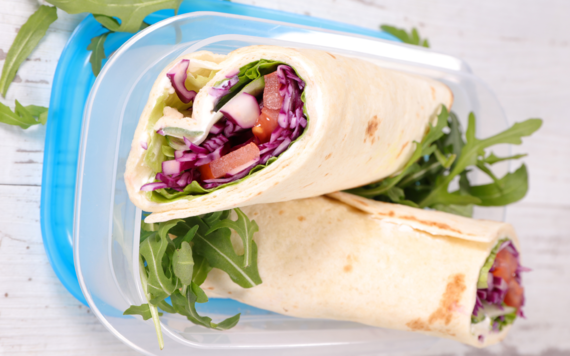 Lunchbox with two salad wraps