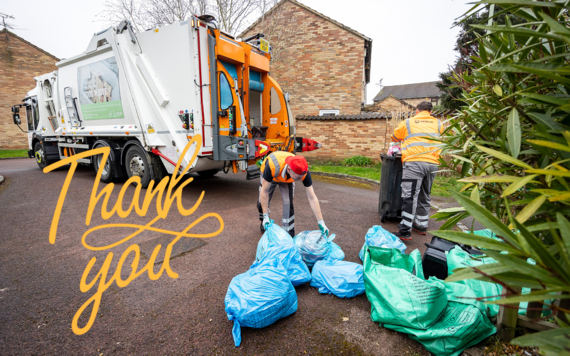 Two crew members handling some general waste bags and recycling bags behind a waste collection truck. The bottom left hand corner reads thank you