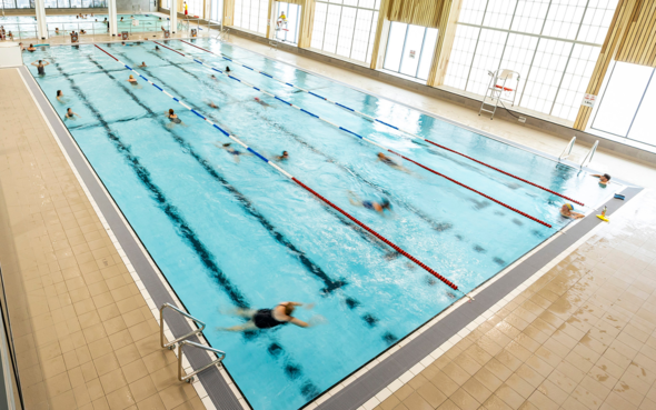 Carnival Hub swimming pool with people in it