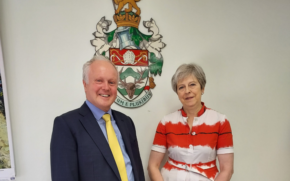 Leader of the council Clive Jones with Theresa May MP at the Wokingham Borough Council offices