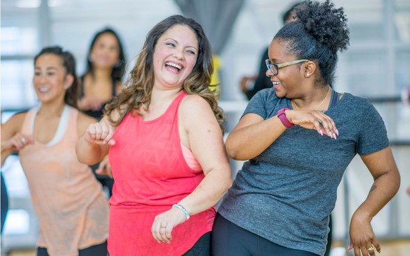 Two people doing Zumba