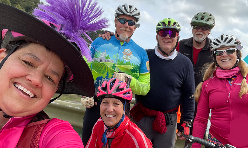 A selfie of three female and three male cyclists