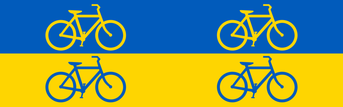 silhouttes of bicycles over the Ukrainian flag