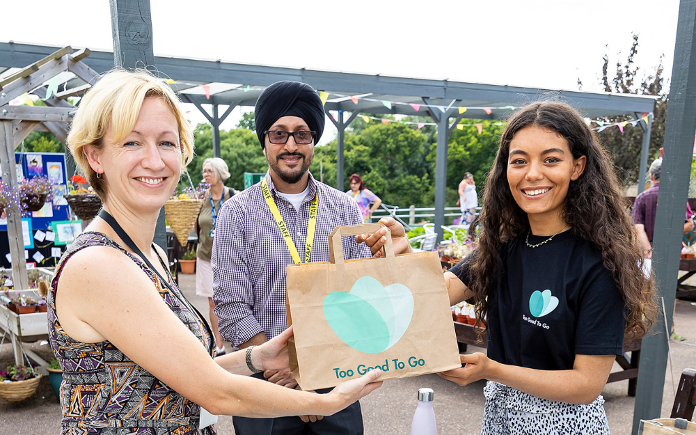 Cllr Sarah Kerr gets a magic bag from Too Good to Go 