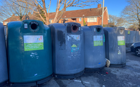 Some mixed glass bottle banks on the street