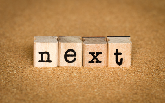 Four blocks making up the word next