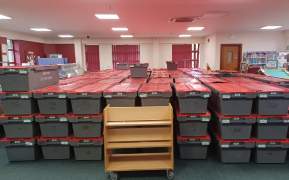 Boxes of books packed up to move to the new library at the Carnival Hub