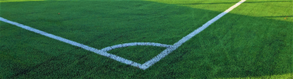 Close up of the corner of an artificial sports pitch