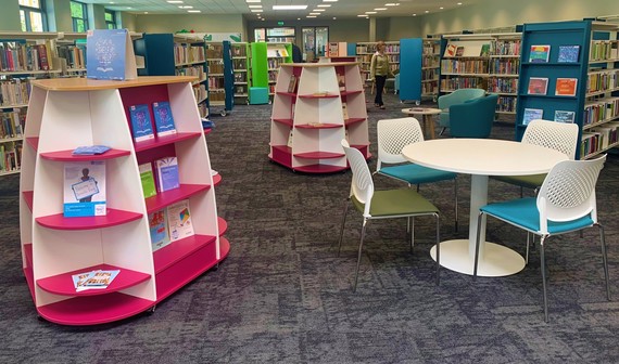 Shot of the browsing area with colourful shelving at the new Wokingham town centre library