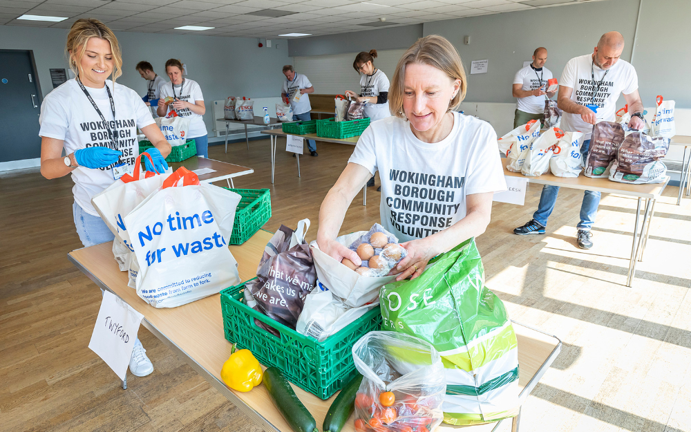 Covid-19 volunteers fill bags with essentials for the most vulnerable