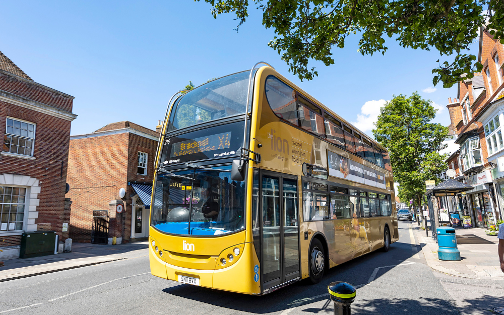 An X4 double decker Reading buses service leaves Broad Street bus stop in Wokingham