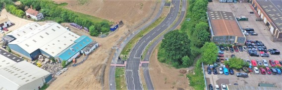 overhead view of a bend in the Nine Mile Ride Extension with pedestrian crossing and separate shared footway and cycleway