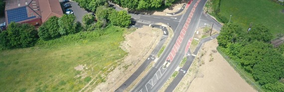 Overhead view of Nine Mile Ride Extension at a junction with side roads