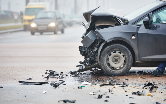 Close up of the front of a car all smashed up