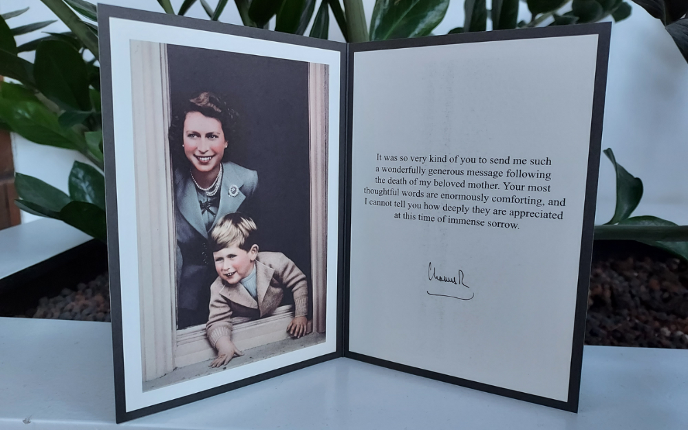 A copy of the card received by wokingham borough mayor Cllr Caroline Smith, including picture of King Charles as a child with his mother