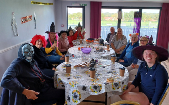 Residents dressed up for halloween at dementia friendly tea dance 