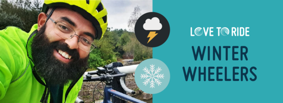 Picture of a smiling cyclist in high vis and helmet with Winter Wheelers logo