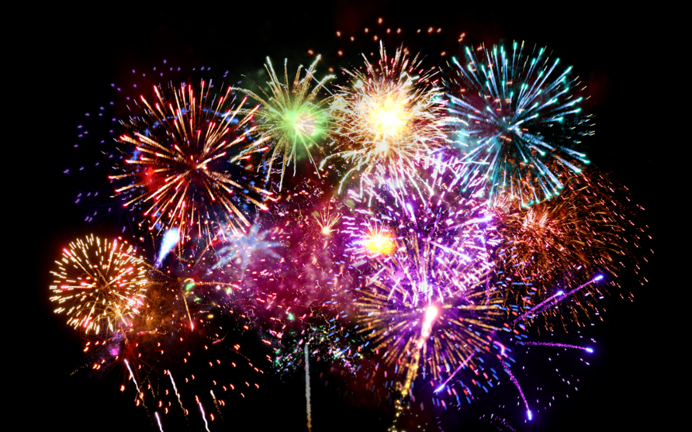 An array of colourful fireworks on a night's sky