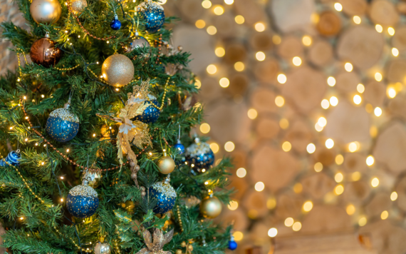 A Christmas tree with baubles and tinsel