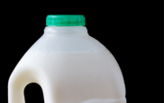 A green cap on a plastic milk bottle